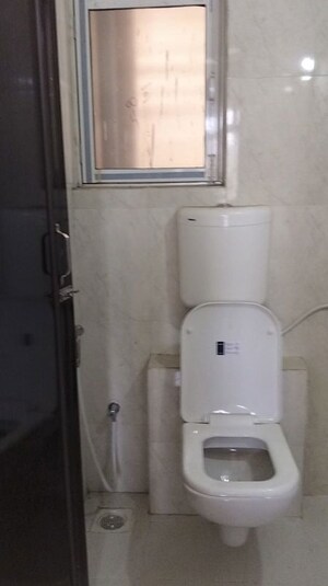 Bathroom in 1 BHK Apartment at Raunak Bliss, Ghodbunder Road – for Rent