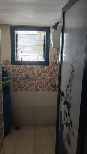 Bedroom in 1 BHK Apartment at Om Sai Charan CHS Dombivli, Dombivli West – for Rent
