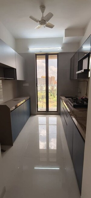 Kitchen in 2 BHK Apartment at USD Unique Vistas, Manpada – for Rent