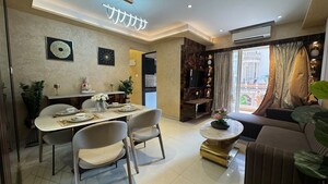 Living Room in 2 BHK Apartment at Tharwani Meghna Montana, Ambernath West – for Sale
