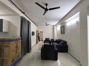 Living Room in 2 BHK Apartment at Conscient Habitat 102, Sector 102 – for Rent