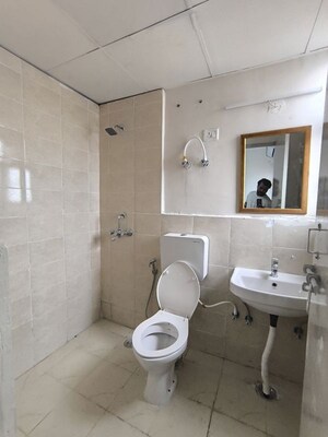 Bathroom in 2 BHK Apartment at Conscient Habitat 102, Sector 102 – for Rent