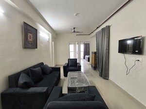Living Room in 2 BHK Apartment at Conscient Habitat 102, Sector 102 – for Rent