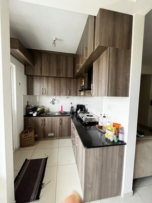Kitchen in 2 BHK Apartment at Provident Neora, Thanisandra Main Road – for Rent