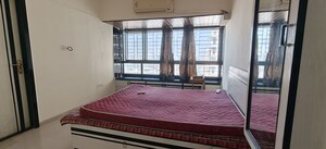 Bedroom in 2 BHK Apartment at Maharaja Retreat CHS, Goregaon East – for Rent