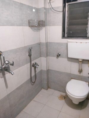 Bathroom in 1 BHK Apartment at Poonam Kirti CHS Ltd, Poonam Nagar – for Rent