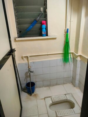 Bathroom in 1 BHK Apartment at Poonam Kirti CHS Ltd, Poonam Nagar – for Rent