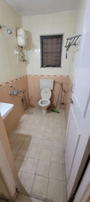 Bathroom in 2 BHK Apartment at Hyde Park Galaxy, Manpada – for Rent