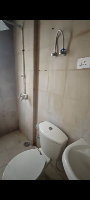 Bathroom in 3 BHK Apartment at Ajnara Integrity, Raj Nagar Extension – for Sale