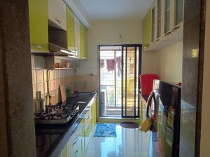Kitchen in 2 BHK Apartment at Kesar Gardens, Kharghar – for Rent