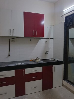 Kitchen in 2 BHK Apartment at Kamdhenu Eden Garden, Kharghar – for Rent