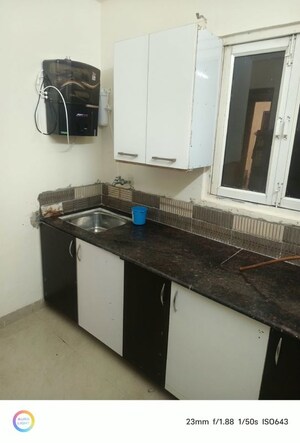 Kitchen in 2 BHK Apartment at Aims Golf City, Sector 75 – for Rent