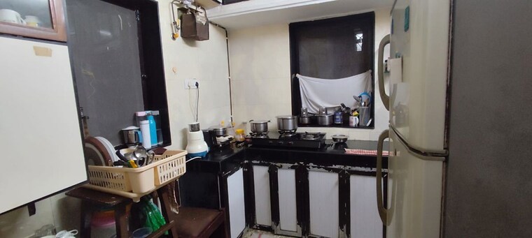 Kitchen, red-rose 1 Bedroom 700 Sq.Ft. Apartment In Santacruz East Mumbai 10758319