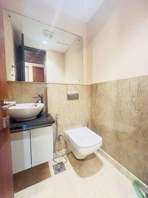 Bathroom in 3 BHK Apartment at Ambience Tivertone, Sector 50 – for Rent