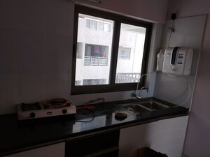 Kitchen in 3 BHK Apartment at Paranjape Blue Ridge, Hinjewadi – for Rent