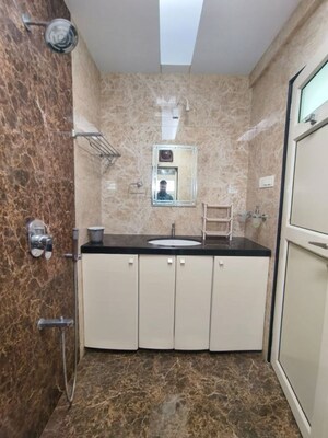 Bathroom in 2 BHK Apartment at Gagangiri Laxman Tower, Dahisar West – for Rent
