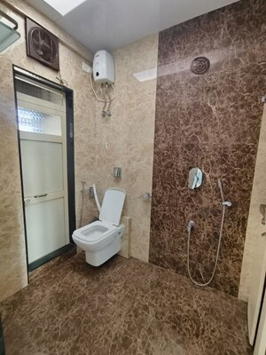 Bathroom in 2 BHK Apartment at Gagangiri Laxman Tower, Dahisar West – for Rent