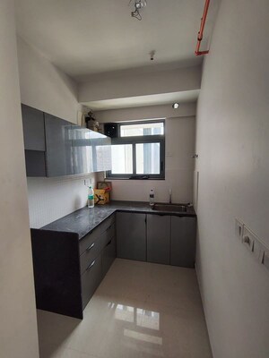 Kitchen in 1.5 BHK Apartment at Kalpataru Elitus, Mulund West – for Rent