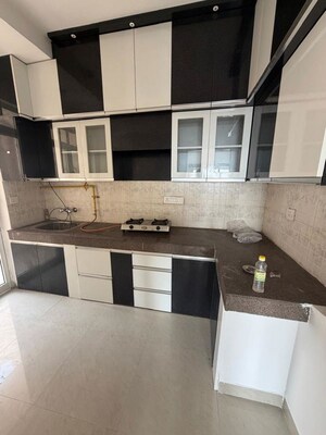 Kitchen in 2 BHK Apartment at ATS Allure, Sector 22d Yamuna Expressway – for Rent