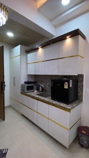 Kitchen in Studio Apartment at Gaur City Center, Sector 4 Greater Noida – for Rent