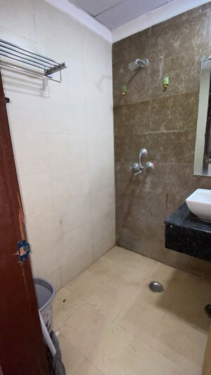 Bathroom in Studio Apartment at Gaur City Center, Sector 4 Greater Noida – for Rent