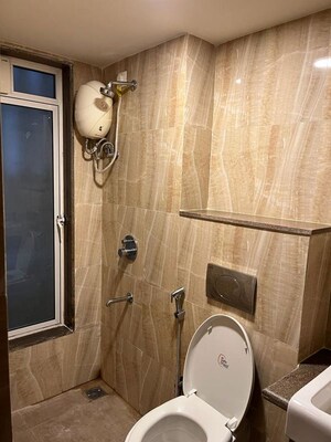 Bathroom in 1.5 BHK Apartment at Lodha Amara, Kolshet Road – for Rent
