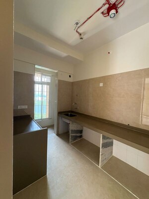 Kitchen in 2 BHK Apartment at Dosti Tulip, Balkum Pada – for Rent