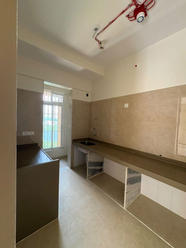 Kitchen, dosti-tulip 2 Bedroom 674 Sq.Ft. Apartment In Balkum Pada Thane 10758743