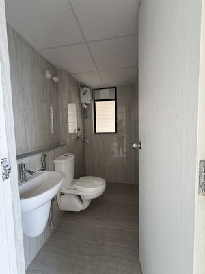 Bathroom in 1 BHK Apartment at Runwal Gardens, Dombivli East – for Sale