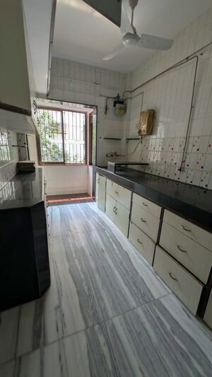Kitchen in 3 BHK Penthouse at Om Ashish C.H.S, Malad West – for Rent