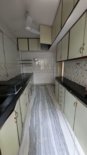 Kitchen in 3 BHK Penthouse at Om Ashish C.H.S, Malad West – for Rent