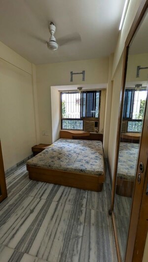 Bedroom in 3 BHK Penthouse at Om Ashish C.H.S, Malad West – for Rent