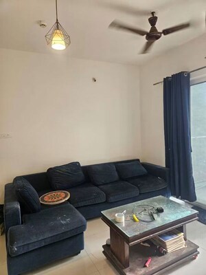Living Room in 2 BHK Apartment at Godrej Hillside, Mahalunge – for Rent