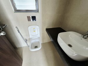 Bathroom in 1.5 BHK Apartment at Runwal My City Phase II Cluster 05, Dombivli East – for Rent