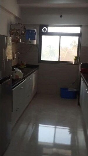 Kitchen in 3 BHK Apartment at Roha Satsang Bharti, Malad East – for Sale
