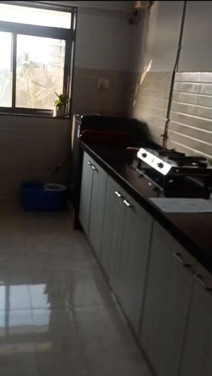 Kitchen in 3 BHK Apartment at Roha Satsang Bharti, Malad East – for Sale