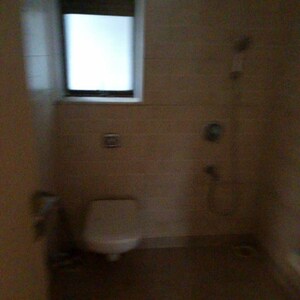 Bathroom in 3 BHK Apartment at Roop Darshani, Juhu Road – for Rent