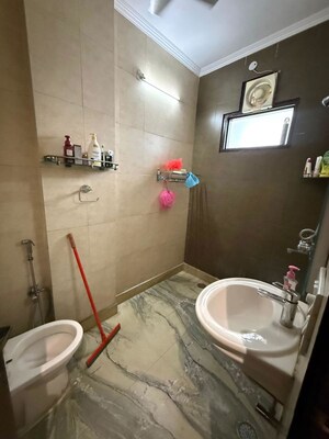 Bathroom in 3 BHK Builder Floor at Paschim Vihar – for Sale