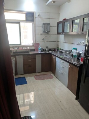 Kitchen in 2 BHK Apartment at Pride Presidency Luxuria, Ghodbunder Road – for Rent