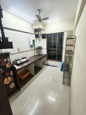 Kitchen in 1 BHK Apartment at Surya Upvan CHS, Gawand Baug – for Rent