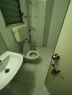 Bathroom in 1 BHK Apartment at Surya Upvan CHS, Gawand Baug – for Rent