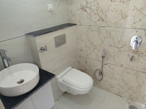 Bathroom in 3 BHK Builder Floor at Motia Blue Ridge, Dhakoli – for Sale
