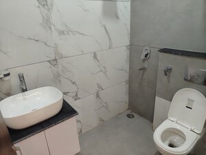 Bathroom in 3 BHK Builder Floor at Motia Blue Ridge, Dhakoli – for Sale