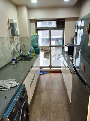 Kitchen in 2 BHK Apartment at NRI Complex Phase 2, Seawoods – for Rent