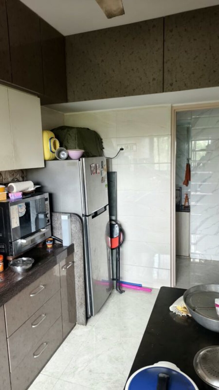 Kitchen, holy-cross-apartment 2 Bedroom 860 Sq.Ft. Apartment In Jogeshwari East Mumbai 10759138
