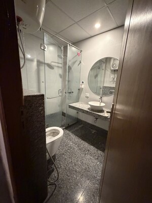Bathroom in 2.5 BHK Apartment at Antriksh Golf View, Sector 78 – for Sale