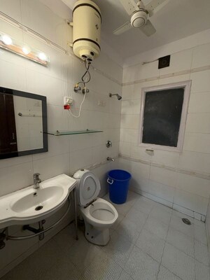 Bathroom in 4 BHK Builder Floor at Nehru Enclave – for Rent