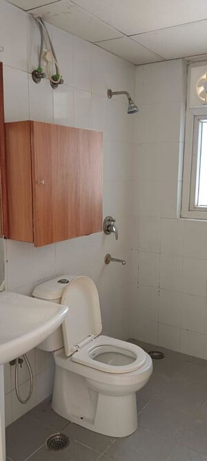 Bathroom in 4 BHK Apartment at Dhoot Time Residency, Sector 63 – for Sale