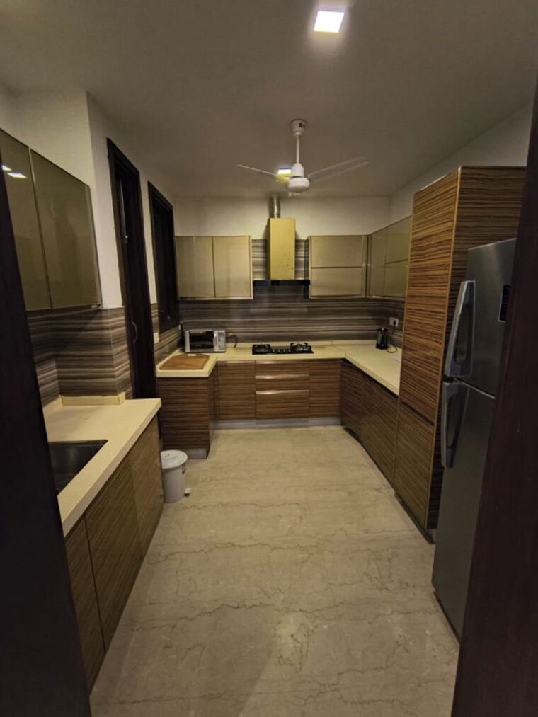 Kitchen, defence colony 3 Bedroom 217 Sq.Yd. Builder Floor In Defence Colony Delhi 10759275