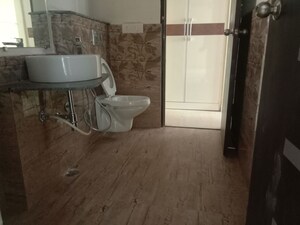 Bathroom in 3 BHK Apartment at Gaur Sportswood, Sector 79 – for Sale